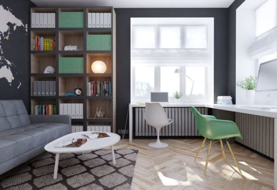 Salón de estudio en casa para jóvenes, paredes de color gris y detalles en verde