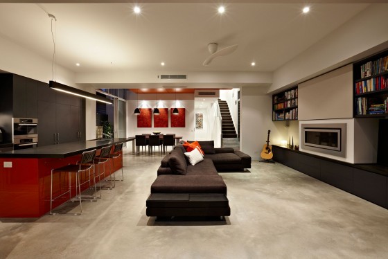 Diseño de  interiores de sala moderna tonos rojos, grises y blancos