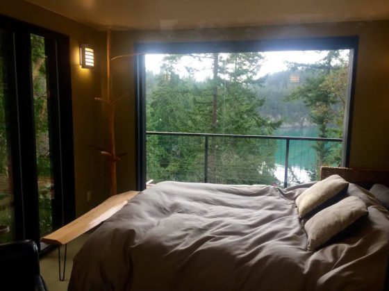 Dormitorio vista al lago